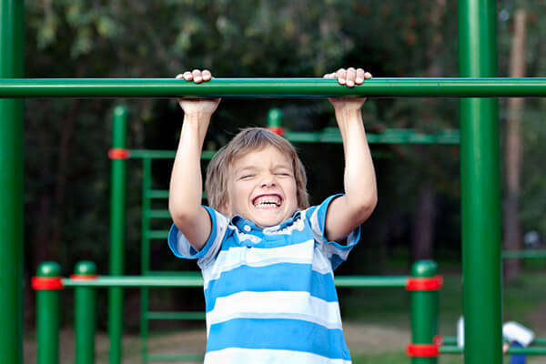 Boy playing sports outdoors